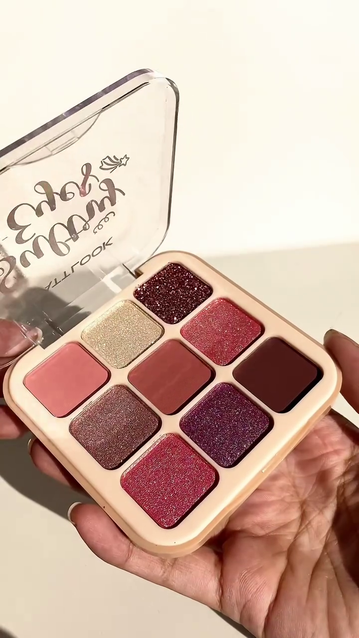 Charming Nude and Pink Eyeshadow Palette Featuring a Blend of Matte and Glitter Shades for Elegant and Sparkling Eye Looks