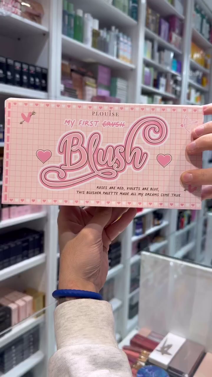 A cute blush palette featuring heart-shaped pans with different shades of pink, each embossed with charming messages. Perfect for adding a sweet and playful touch to your makeup look.