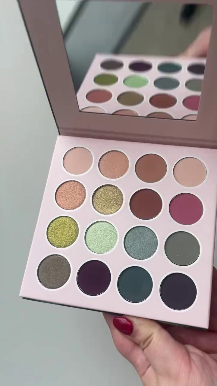 Vibrant 16-Color Eyeshadow Palette with Matte and Shimmer Shades in Bold Greens, Purples, and Neutrals for Creative Makeup Looks