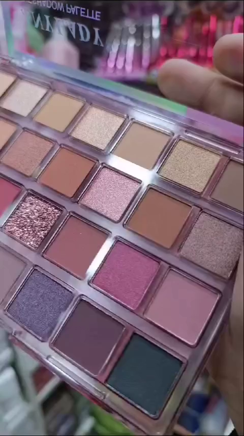 24-Color Matte and Shimmer Eyeshadow Palette with Vibrant Hues, Including Bold Pinks, Neutrals, and Pops of Color for Versatile Makeup Looks
