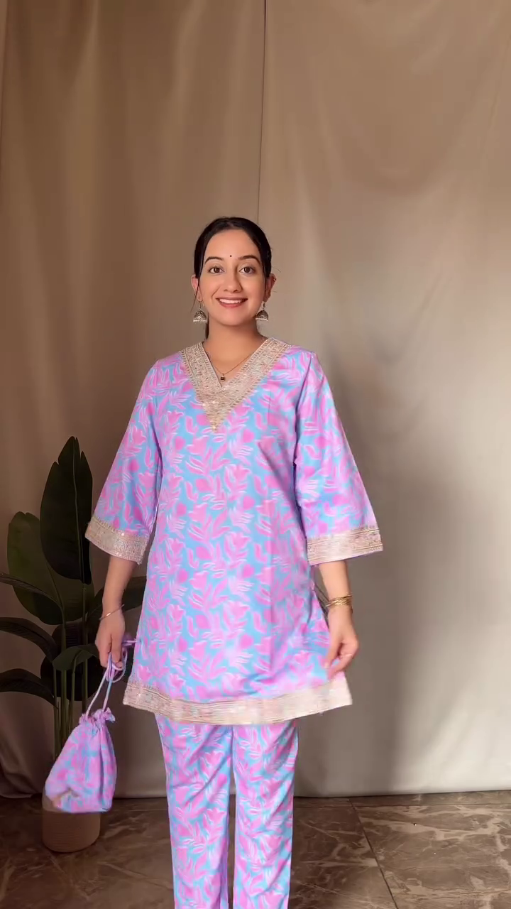 Embroidered Off-White Kurti Set – Featuring Intricate Floral Motifs, Tassel Detailing, and Comfortable Palazzo Pants for a Chic Traditional Look