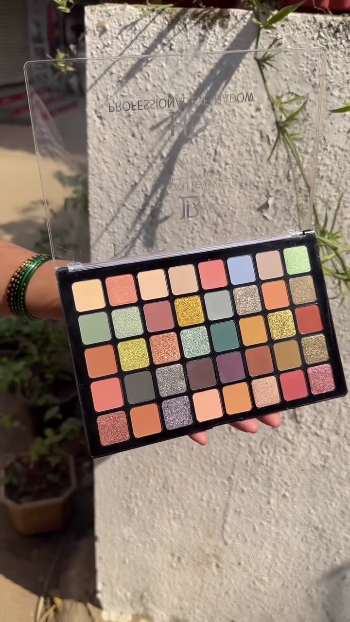 Stunning 40-Color Eyeshadow Palette with Matte, Shimmer, and Glitter Shades in Warm Neutrals, Bold Greens, and Vibrant Pops of Color – Perfect for Any Occasion