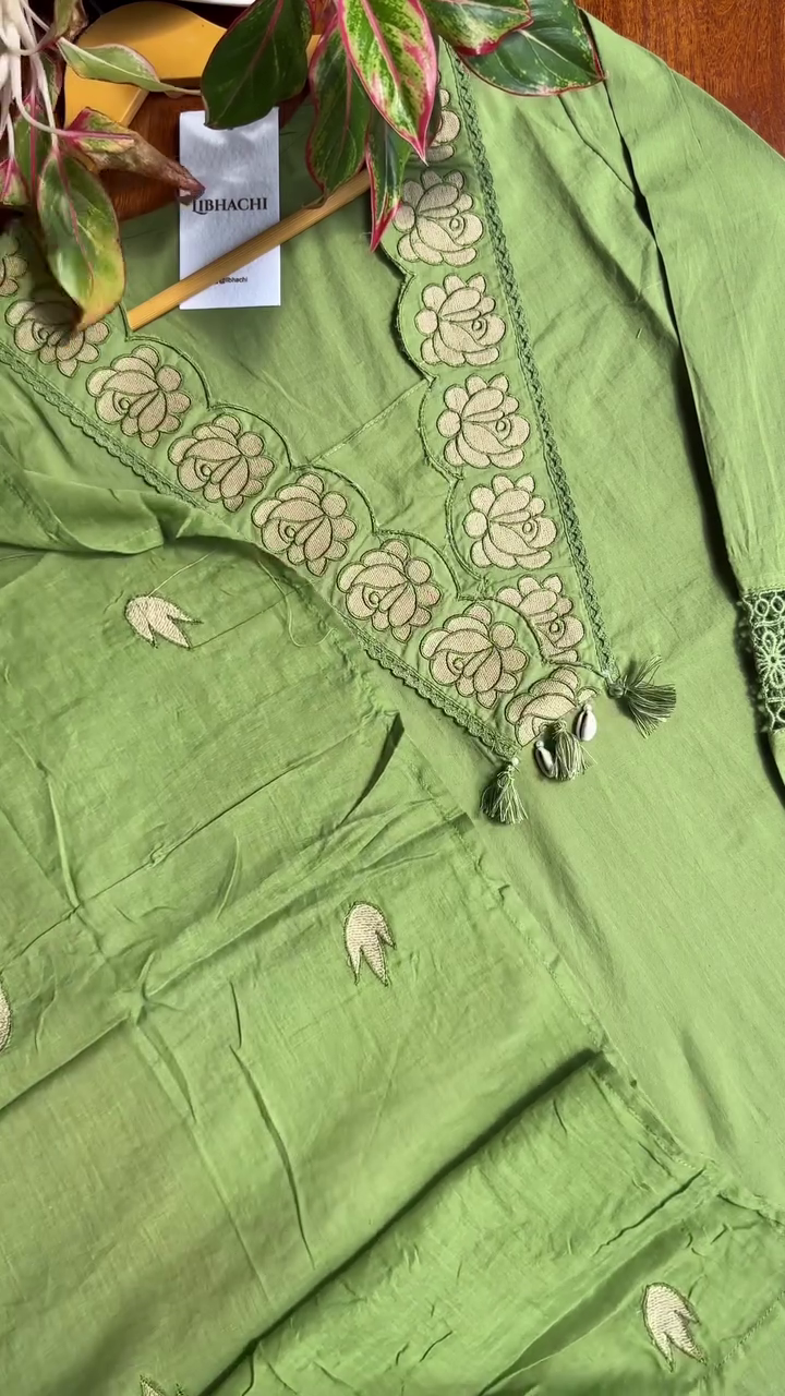 Green Embroidered Cotton Kurta with Floral Detailing and Tassel Accents for a Sophisticated Traditional Look