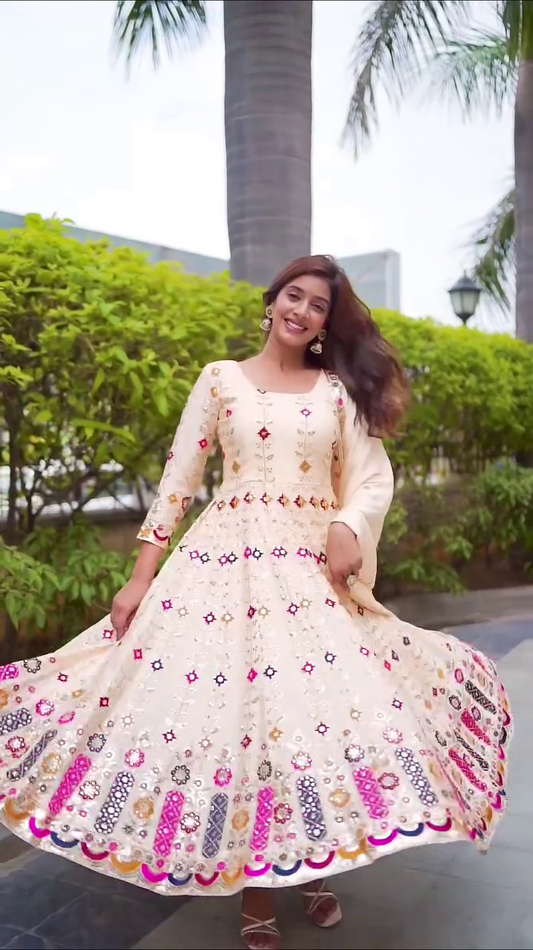 Elegant Cream Anarkali Dress with Colorful Floral Embroidery and Sequin Detailing, Perfect for Weddings, Festivals, or Special Occasions