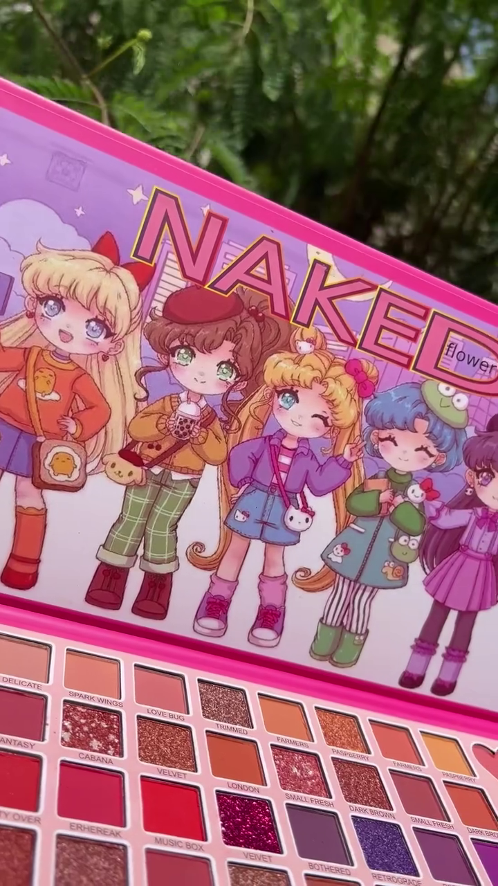 Vibrant 35-Shade Eyeshadow Palette with Matte, Shimmer, and Glitter Finishes – Featuring Bold Reds, Pinks, Purples, and Neutrals with Fun Cartoon Packaging