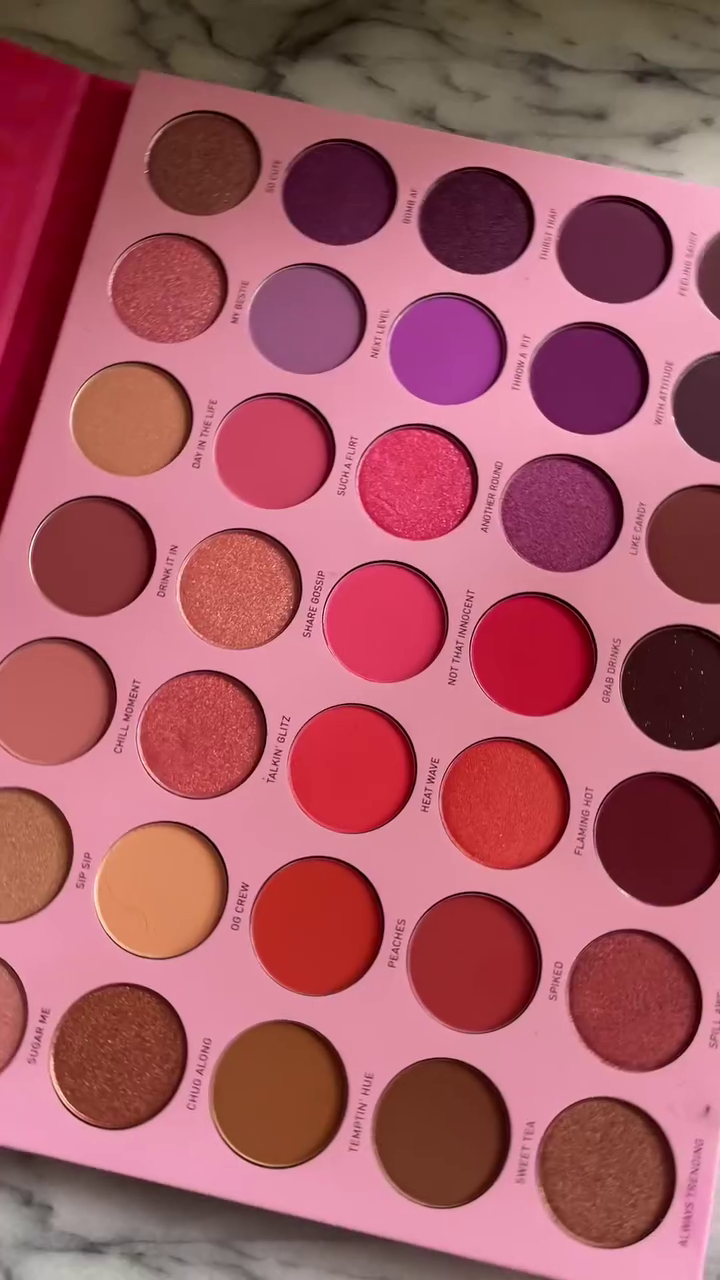 Vibrant Pink and Purple Eyeshadow Palette with 35 Shades in Matte, Shimmer, and Metallic Finishes for Bold and Colorful Eye Looks