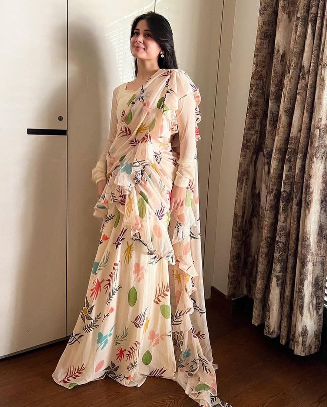 Gunjan Kunwar in Off White Printed Ruffle Lehenga Pre Drapped Saree