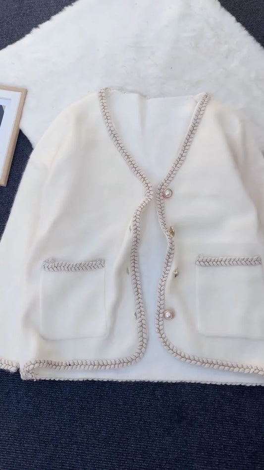 Elegant Long Knitted Cardigan with Pearl Buttons and Braided Trim – Classic Cream Winter Wear