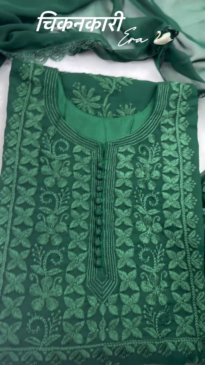 A beautiful green chikankari kurta set with delicate floral embroidery on the sleeves and dupatta, perfect for a traditional or festive look. Ask ChatGPT