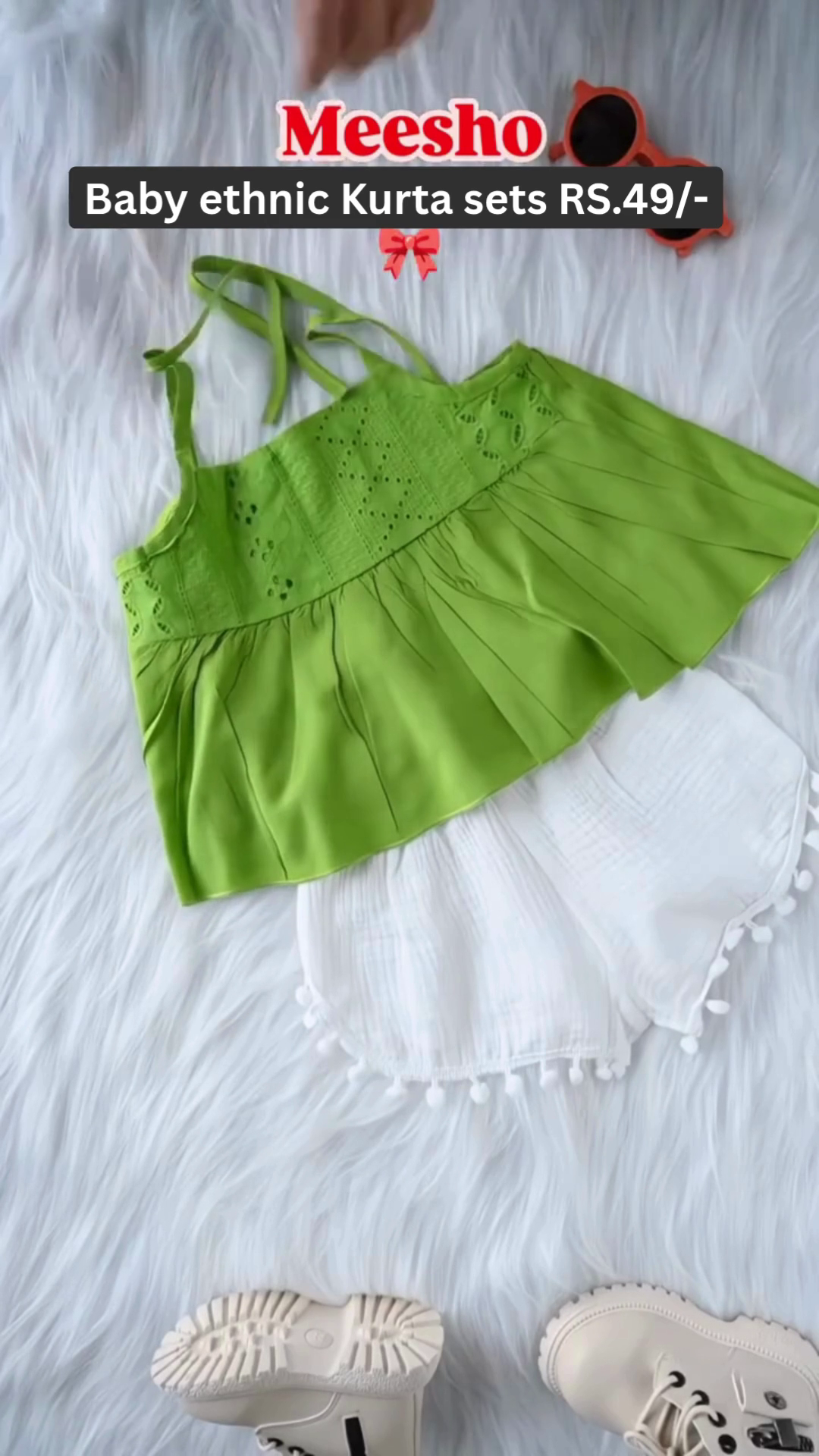 Stylish Baby Green Top and White Pom-Pom Shorts Set – Comfortable Summer Outfit for Girls