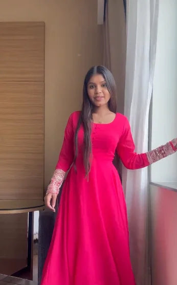 Graceful Solid Pink Anarkali Gown with Full Sleeves – Elegant Flared Ethnic Dress for Festive and Party Wear