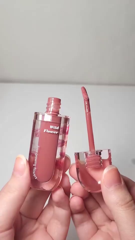 Wild Flower Capsule Lip Gloss – Moisturizing Nude Pink Liquid Lip Color in Aesthetic Transparent Bullet-Shaped Packaging with Floral Design and Smooth Glossy Finish, Ideal for Everyday Wear