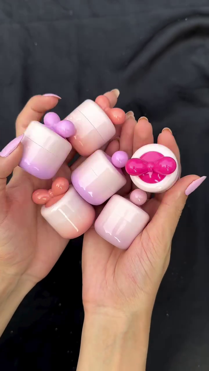 Colorful Lip Balm Collection – Set of 5 Vibrant Lip Balms in Pink and Coral Shades with Cute Bow-tie Design, Providing Moisture and a Pop of Color
