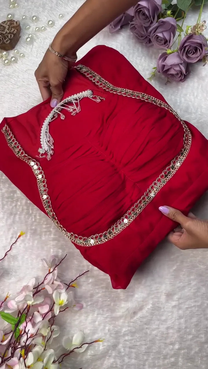 Exquisite Deep Red Chiffon Ethnic Kurta Set with Intricate Gold Mirror Work Neckline, Drawstring Detail, Pearl Tassel Accents, and Matching Comfort-Fit Trousers and Dupatta