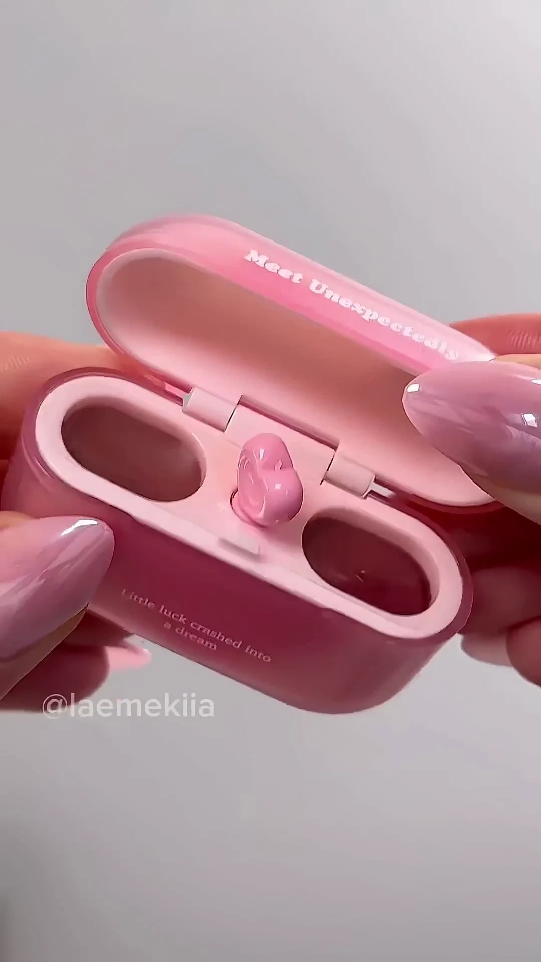 Heart-Centric Little Luck Dream Balm: A Translucent Pink Gloss and Cheek Tint in a Chic AirPods-Style Case