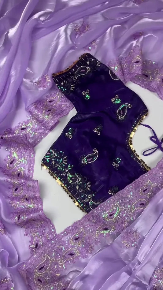 Stunning Lilac Sheer Organza Saree Featuring Intricate Thread Embroidery and Iridescent Sequins on the Border, Paired with a Rich Royal Purple Paisley Embroidered Blouse