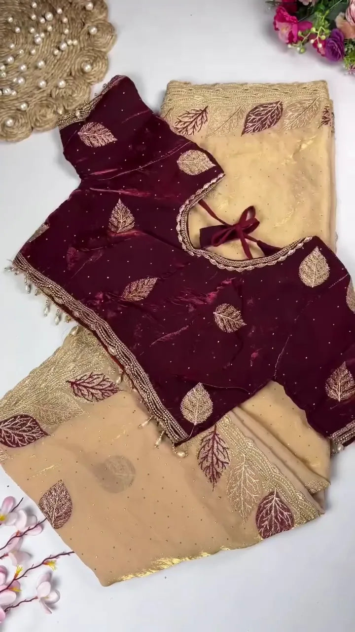 Ready-to-Wear Ensemble: Light Sage Green Saree with Elaborate Gold Border and Leaf Motifs, Featuring a Contrasting Deep Bottle Green Blouse Intricately Detailed with Matching Zari Embroidery and Sequin Accents