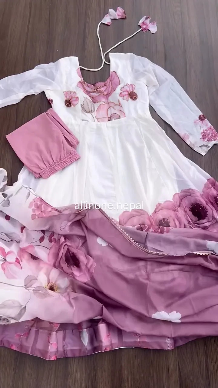 White Anarkali Style Suit Featuring Soft Pink Watercolor Floral Print Accents on the Yoke and Hem, Paired with a Coordinating Dusty Rose Gathered Bottom and a Matching Printed Dupatta