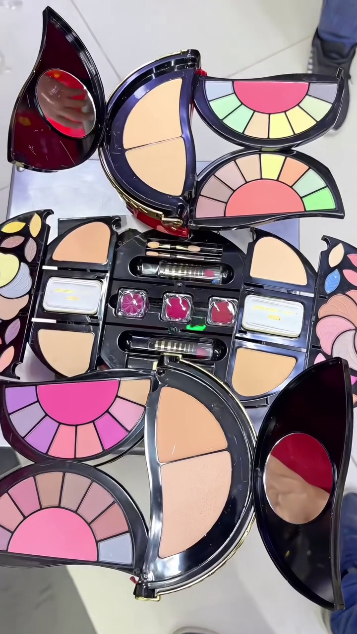 All-in-One Professional Makeup Kit with Eyeshadows, Blushers, Compact Powders, Lip Colors, and Applicators in Stylish Folding Box Design