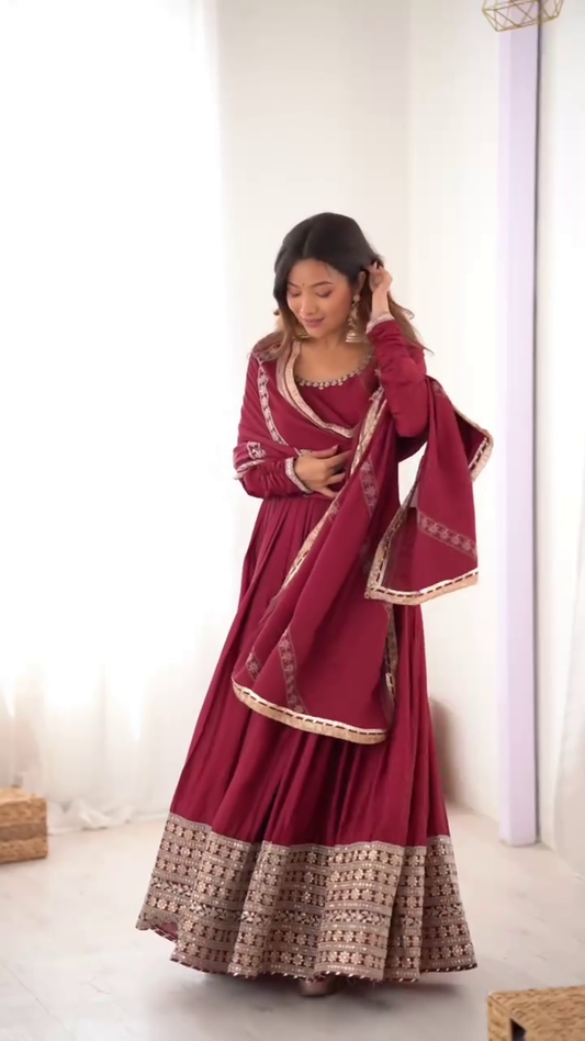 Exquisite Maroon Anarkali with Intricate Gold Embroidery and a Flowing Dupatta, Ideal for Festive and Traditional Occasions