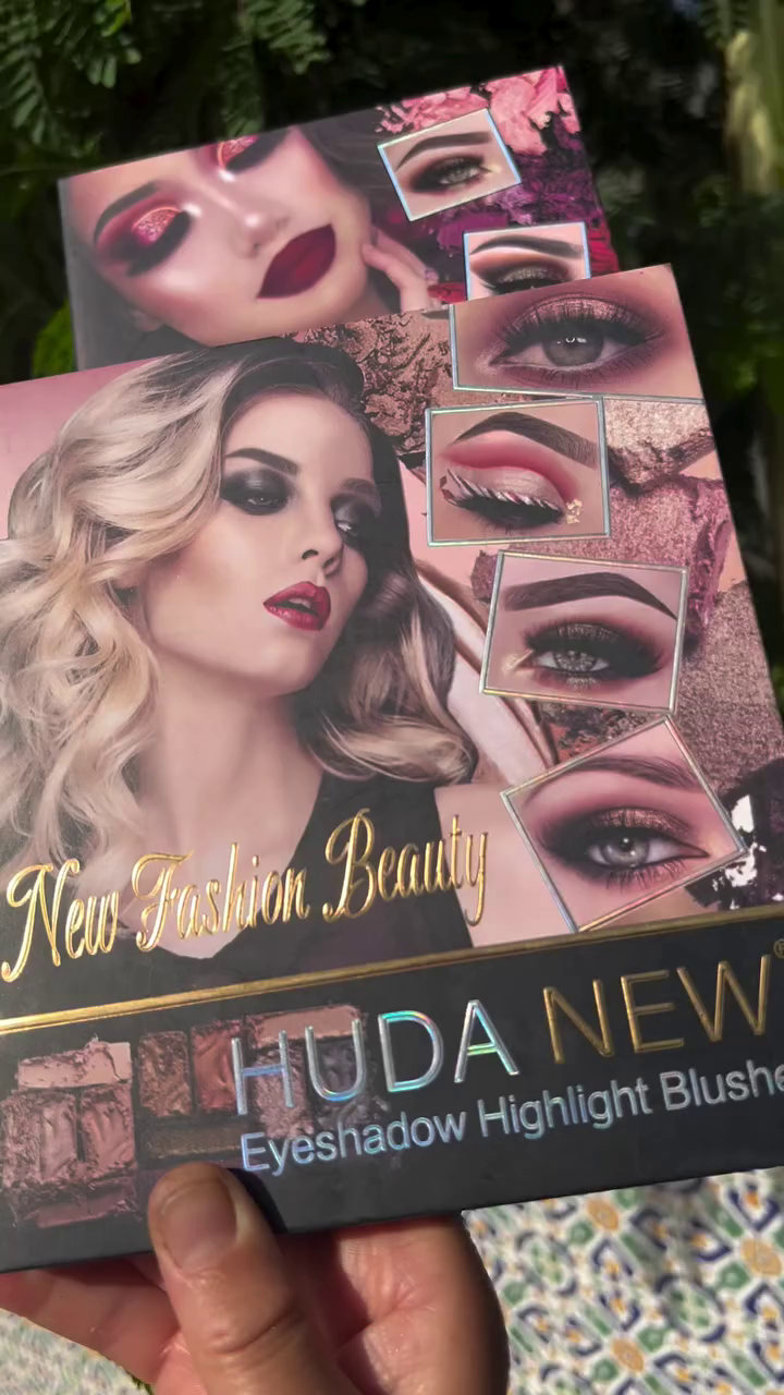 Vibrant and Bold Eyeshadow Palette Featuring a Stunning Array of Red, Pink, and Orange Shades with Glittery and Matte Finishes, Accentuated by Heart and Star Imprints for a Touch of Glamour
