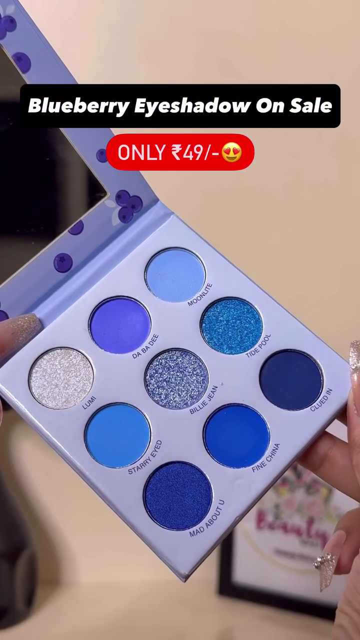 Blueberry-Inspired 9-Color Eyeshadow Palette Featuring Matte and Shimmer Shades in Vibrant Blues and Sparkling Tones – Perfect for Bold, Creative, and Glamorous Eye Makeup Looks
