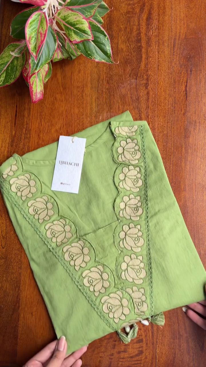 Green Embroidered Cotton Kurta with Floral Detailing and Tassel Accents for a Sophisticated Traditional Look