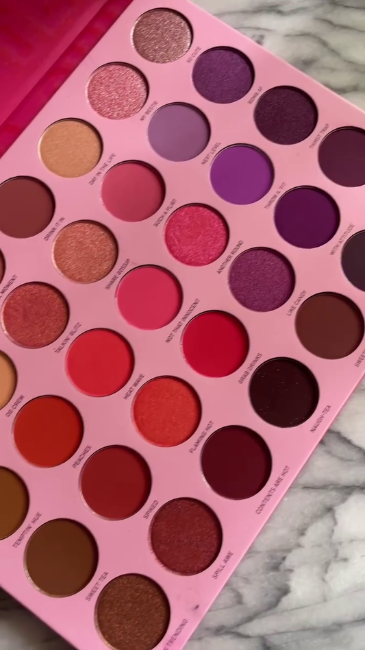 Vibrant Pink and Purple Eyeshadow Palette with 35 Shades in Matte, Shimmer, and Metallic Finishes for Bold and Colorful Eye Looks