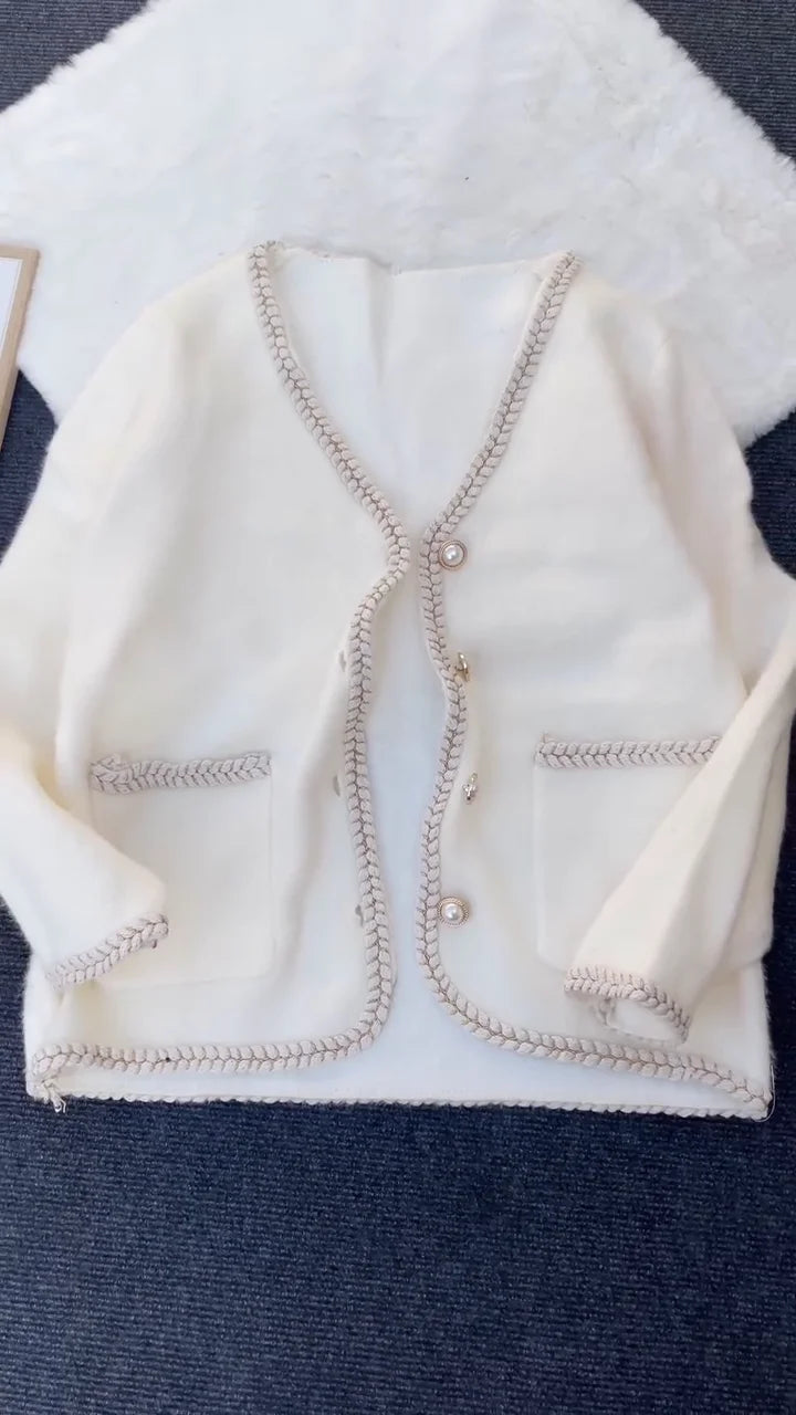 Elegant Long Knitted Cardigan with Pearl Buttons and Braided Trim – Classic Cream Winter Wear