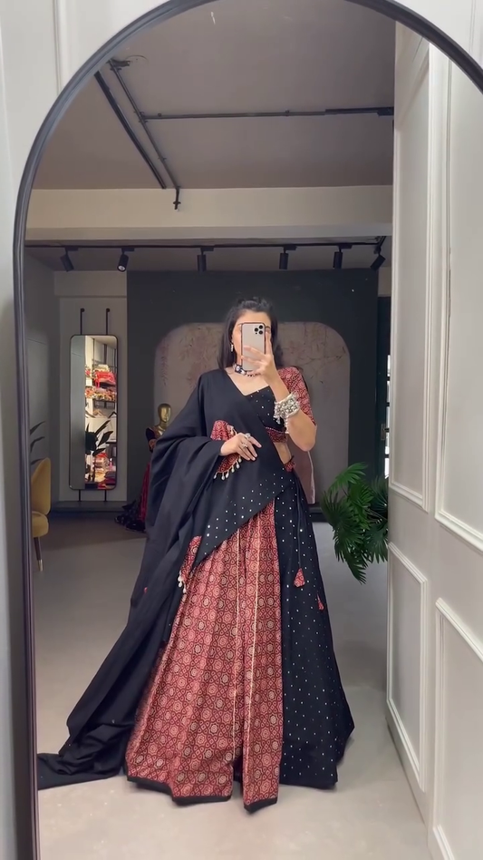 Stunning Black and Maroon Traditional Lehenga Set Printed Flared Skirt, Mirror Work Blouse, and Solid Black Dupatta – A Bold and Elegant Look for Navratri and Ethnic Celebrations