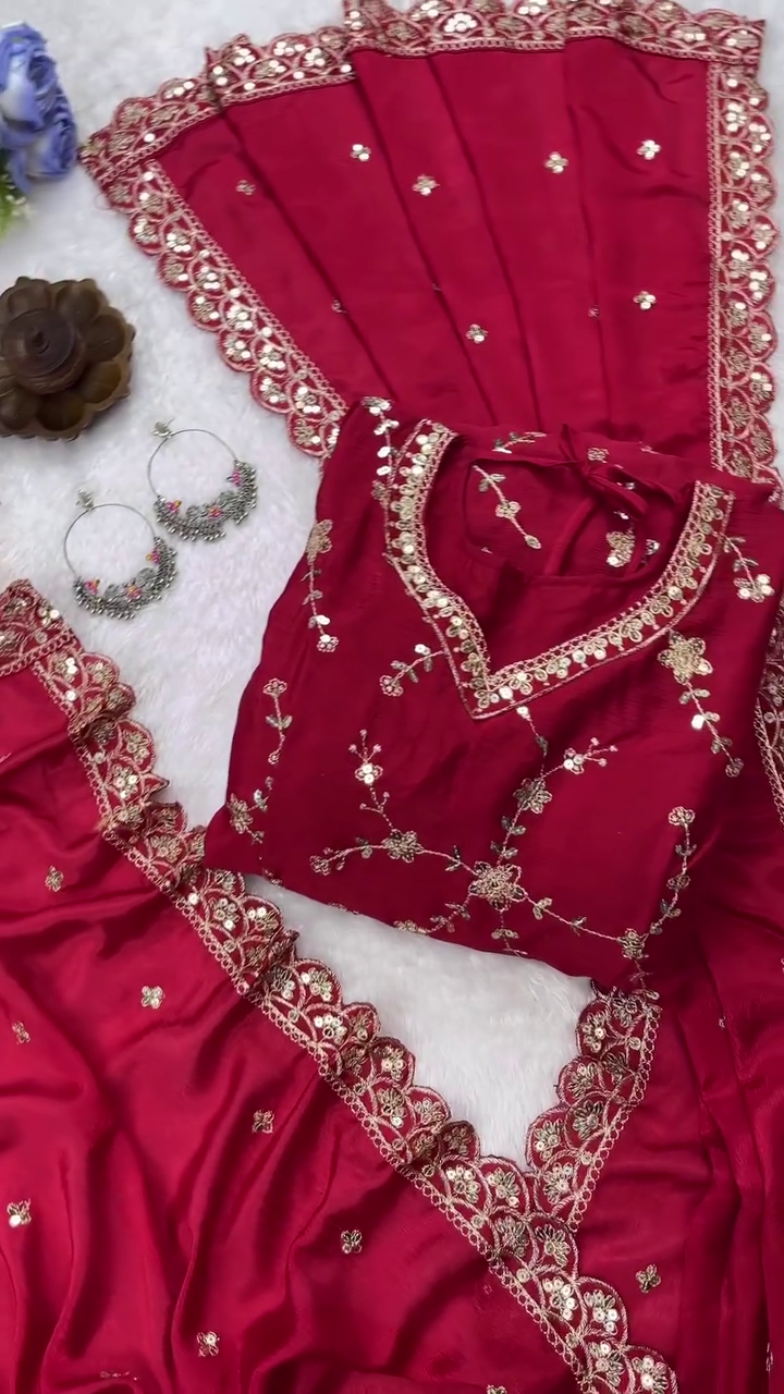 Red Embroidered Anarkali Suit Set with Golden Floral Work, Matching Dupatta, and Traditional Silver Hoop Earrings for Festive Occasions