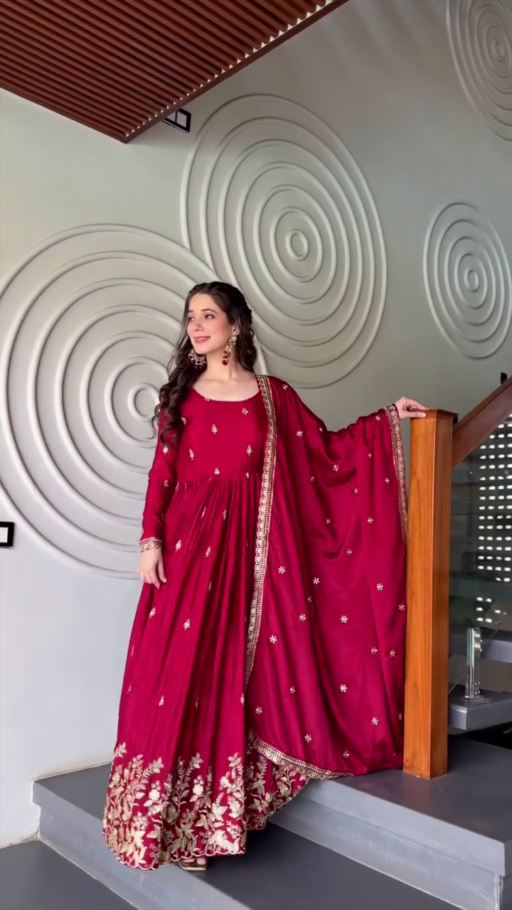 Red Anarkali Dress with Gold Embroidery, Flowing Dupatta, and Elegant Traditional Earrings – Perfect for Festive Occasions and Celebrations