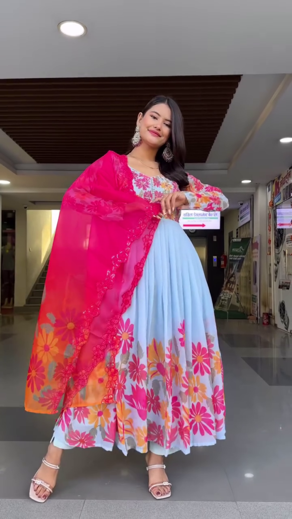 Sky Blue Floral Anarkali Dress with Vibrant Pink Embroidered Dupatta, Featuring Colorful Daisy Print, Intricate Thread Work, and Paired with Delicate Strappy Heels – Perfect for Festive Occasions and Traditional Celebrations - Image 3
