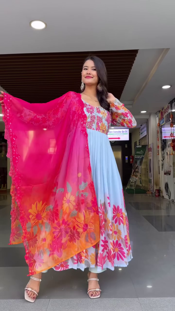 Sky Blue Floral Anarkali Dress with Vibrant Pink Embroidered Dupatta, Featuring Colorful Daisy Print, Intricate Thread Work, and Paired with Delicate Strappy Heels – Perfect for Festive Occasions and Traditional Celebrations - Image 2