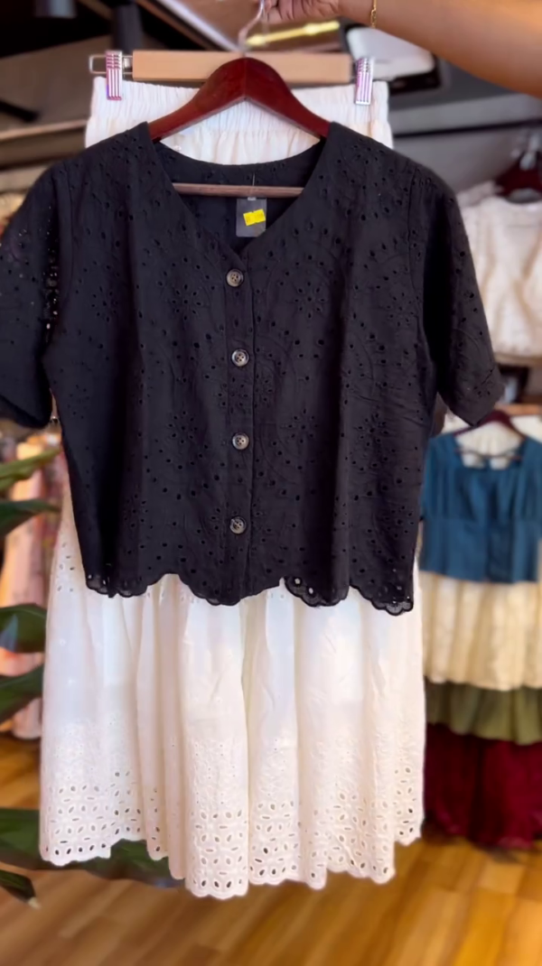 Two-Piece Cotton Co-Ord Set Featuring a Black Short Sleeve Button-Up Broderie Anglaise Top and a White High-Waisted Tiered Midi Skirt with Eyelet Embroidery Detailing – Perfect for Casual Summer Days or Chic Outings - Image 3