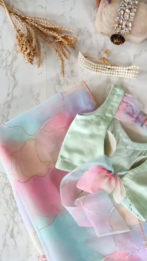 Pastel Rainbow Organza Saree with Gold Outline Detailing and Mint Green Satin Blouse Featuring Organza Bow Accent – Perfect for Elegant Day Events, Festive Occasions, and Contemporary Ethnic Styling