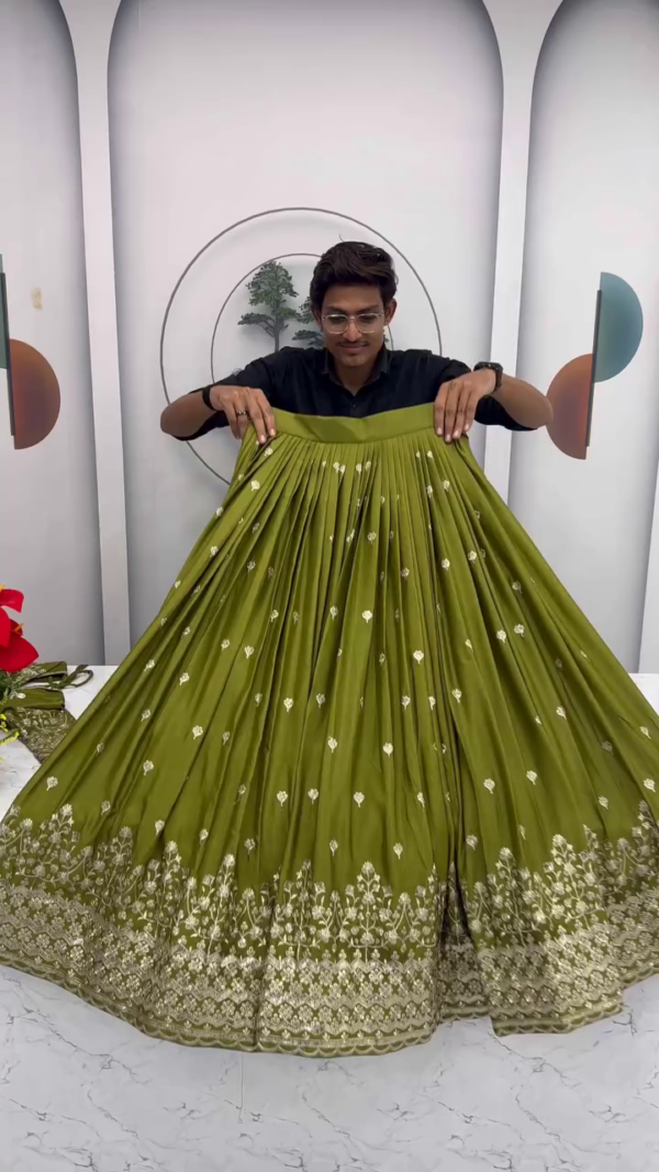 Olive Green Embroidered Lehenga Set – Intricately Handworked Blouse with Heavy Thread & Sequin Border Detailing on Flared Skirt & Dupatta – A Luxe Traditional Look for Weddings & Festive Glam.